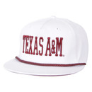 White Texas A&M flat bill snapback hat featuring raised maroon "Texas A&M" lettering outlined in black and a maroon rope accent above the brim. Adjustable cap for game days and everyday wear.