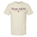 Texas A&M Aggies light colored T shirt with Texas A&M University text on front and Aggie Ring 1876 graphic on back
