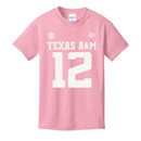 Youth pink Texas A&M football jersey T-shirt featuring white Texas A&M and number 12 graphics on the front with “Gig ’Em Aggies” and number 12 on the back.