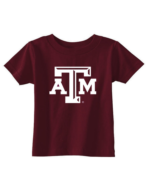 Large white bevel ATM logo centered on the front of the maroon short sleeve t-shirt.