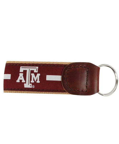 Texas A&M Aggies maroon keychain with strap design, white stripe detail, Texas A&M logo, and metal key ring