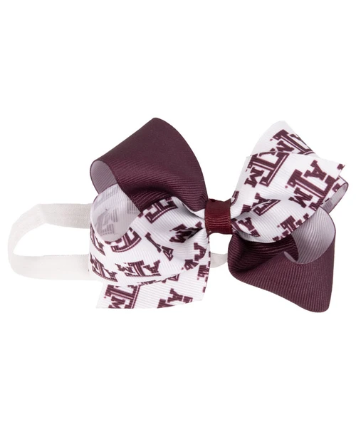 Texas A&M Aggies infant bow on elastic headband with maroon ribbon and Texas A&M logo pattern