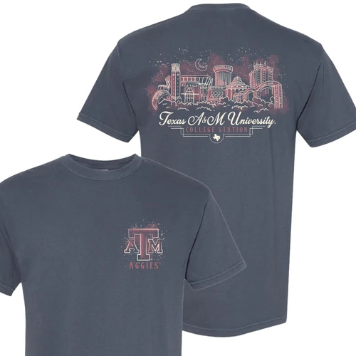 Faded charcoal blue Texas A&M short sleeve T-shirt featuring a small Aggies logo on the front and a colorful campus skyline illustration with Kyle Field and College Station lettering on the back.
