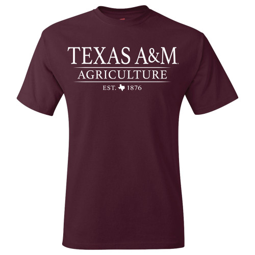 Maroon Texas A&M Agriculture short sleeve T-shirt featuring large white "Texas A&M Agriculture" lettering across the chest with "Est. 1876" printed below. Classic crew neck tee with a traditional collegiate design.