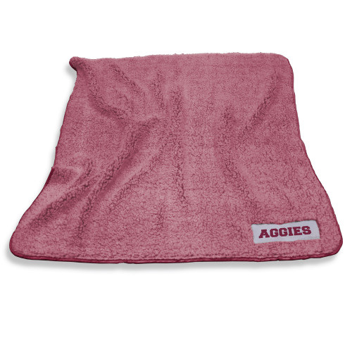Texas A&M heather maroon fleece blanket featuring a soft plush design with a woven "Aggies" patch in one corner. Cozy blanket for game days, tailgates, dorm rooms, and home use.