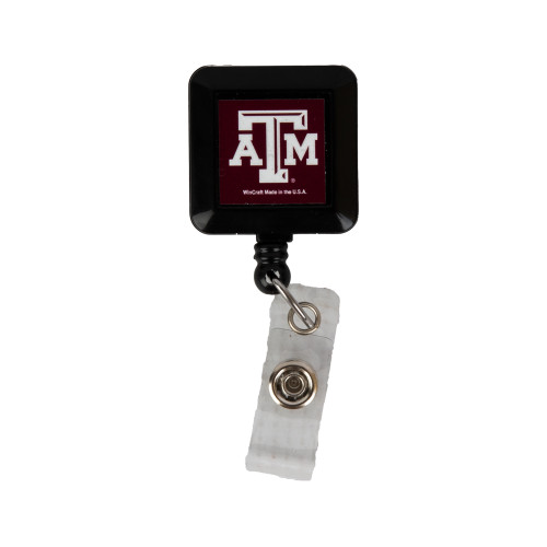 Texas A&M retractable badge reel featuring a maroon square case with the Texas A&M logo, clear vinyl ID strap, and belt clip. Ideal for holding ID badges, access cards, and work credentials.