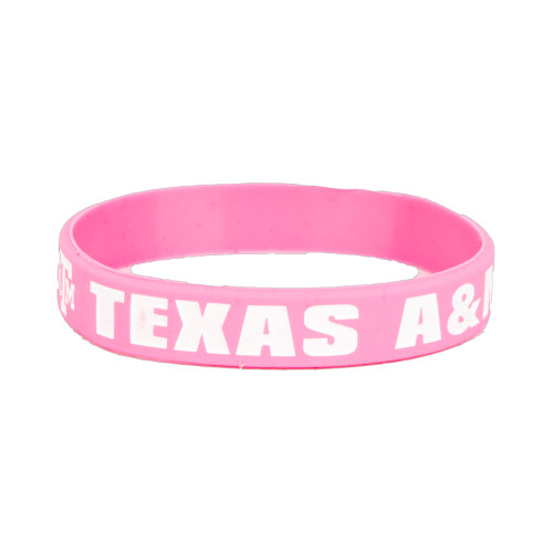Pink Texas A&M silicone wristband featuring bold white "Texas A&M" lettering. Comfortable rubber bracelet perfect for game days, campus events, everyday wear, and showing Aggie pride.