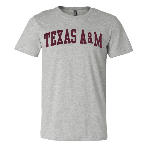 Heather gray Texas A&M T-shirt featuring classic maroon arched "Texas A&M" lettering across the chest. Comfortable short sleeve tee for game days, campus, tailgates, and everyday wear.