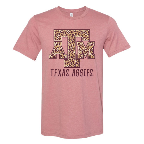 Heather pink Texas A&M youth T-shirt featuring a large leopard print Texas A&M logo with "Texas Aggies" printed below. Stylish short sleeve tee for game days, school, and everyday wear.