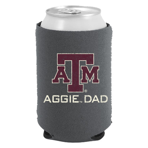 Charcoal gray Texas A&M Aggie Dad can cooler featuring the Texas A&M logo and "Aggie Dad" on the front with a distressed American flag design and vertical "Aggie Dad" graphic on the back. Insulated sleeve for canned beverages.