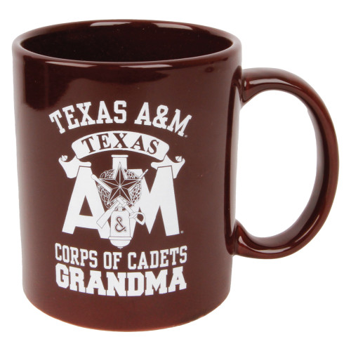 Maroon Texas A&M Corps of Cadets Grandma ceramic mug featuring the Corps of Cadets crest, Texas A&M logo, and bold "Corps of Cadets Grandma" lettering. Coffee mug for everyday use and Aggie pride.