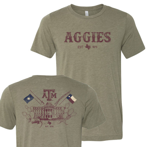 Olive heather Texas A&M T-shirt featuring distressed "Aggies Est. 1876" lettering on the front and a vintage back graphic with the Academic Building, Texas flags, Texas A&M logo, and "Aggieland" script.