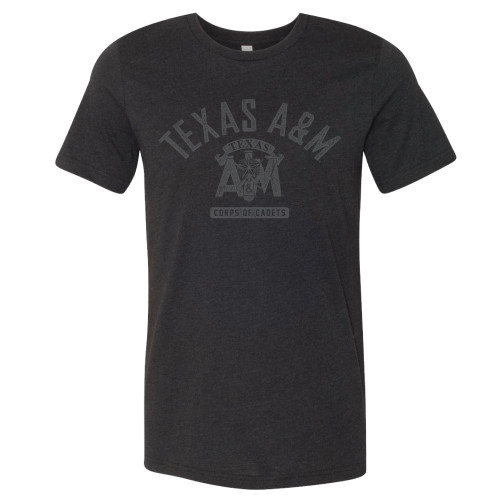 Texas A&M in gray arched over a Corps shield logo centered above the words "Corps of Cadets" on a heather black short sleeve t-shirt. Texas A&M in gray arched over a Corps shield logo centered above the words "Corps of Cadets" on a heather black short sleeve t-shirt.