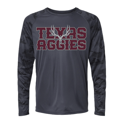 "TEXAS AGGIES" printed in maroon ink bold letters with a white deer skull printed in the center on a dark gray shirt with gray camo print sleeves.