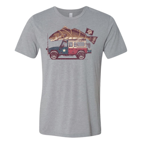 Vintage jeep colored like the Texas flag hauling a large redfish strapped to the roof, printed on a heather gray short sleeve t-shirt.