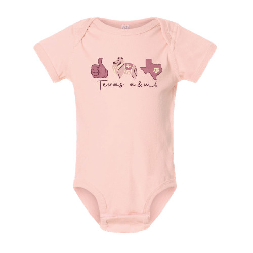 A thumbs up, Reveille, and Texas silhouette centered above script font "Texas a&m" in maroon on the front of the blush colored onesie.