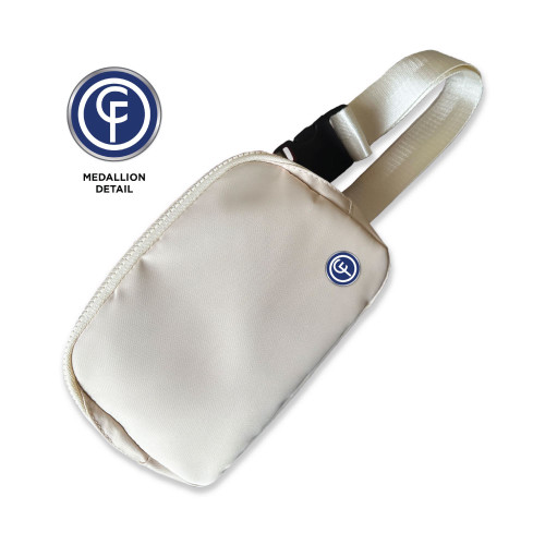 Neutral-colored Chilifest belt bag with adjustable strap and small circular medallion detail featuring the Chilifest logo.