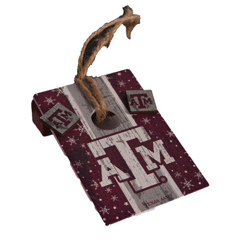Texas A&M cornhole Christmas ornament featuring mini maroon cornhole board with Texas A&M logo and small bean bags for Aggies holiday decor.