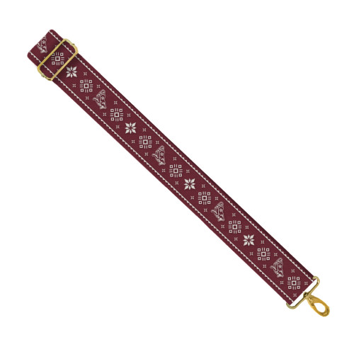 Maroon Texas A&M holiday bag strap with snowflake and Reveille designs plus gold hardware. Maroon Texas A&M holiday bag strap with snowflake and Reveille designs plus gold hardware.