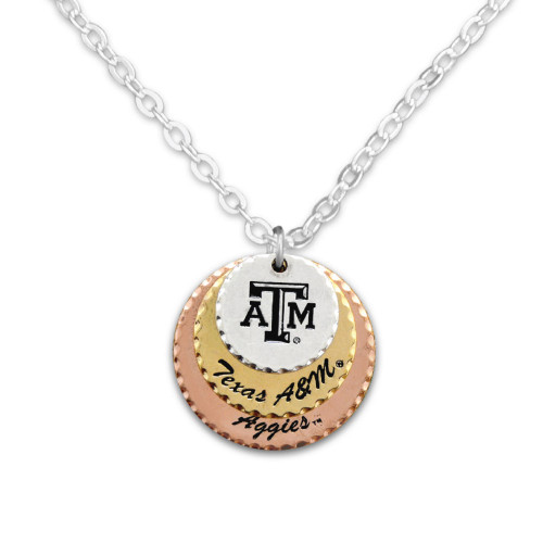 Texas A&M tri-tone layered necklace with ATM logo and “Texas A&M Aggies” inscription. Texas A&M tri-tone layered necklace with ATM logo and “Texas A&M Aggies” inscription.