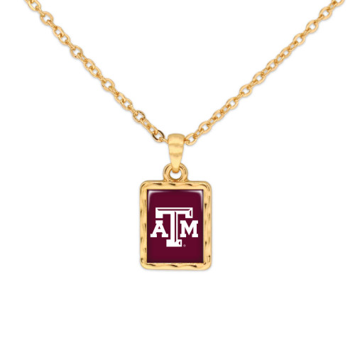 Texas A&M rectangular pendant necklace with maroon background and gold-tone frame on a gold chain. Texas A&M rectangular pendant necklace with maroon background and gold-tone frame on a gold chain.
