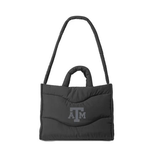 Black Texas A&M puffer tote bag featuring a padded quilted design, tonal Texas A&M logo on the front, short top handles, and a long padded shoulder strap.