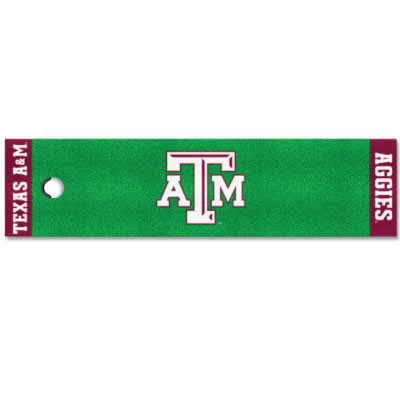 Texas A&M putting green mat featuring a green practice surface, center Texas A&M logo, maroon end panels with "Texas A&M" and "Aggies" lettering, and a putting hole for indoor golf practice.