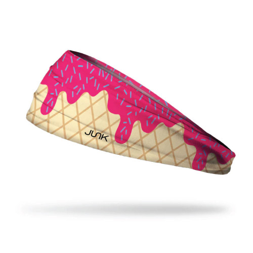 Junk ice cream themed headband with waffle cone pattern, pink dripping icing design, and colorful sprinkle details on stretchy athletic fabric
