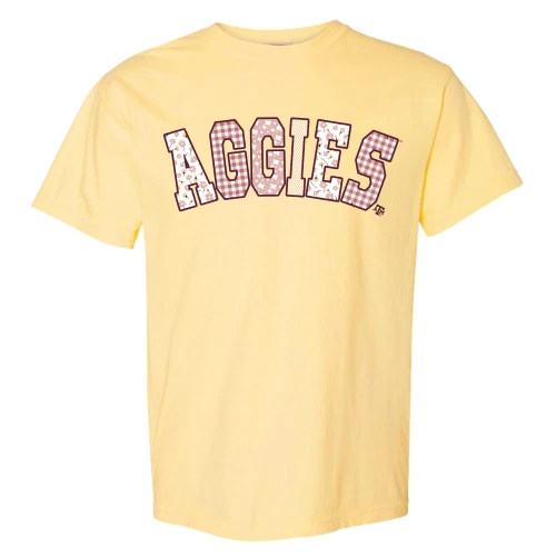 Yellow Texas A&M Aggies shirt with floral and gingham patchwork lettering