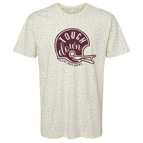 Cream colored Texas A&M t shirt with an all over subtle leopard print pattern featuring a maroon football helmet graphic with “Touch Down” script lettering and “Texas A&M Aggies” text underneath across the front center design