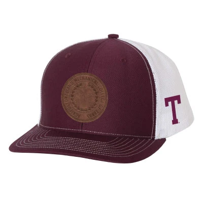 Maroon and white Texas A&M Vault trucker cap featuring a brown circular seal patch on the front, white mesh back panels, side Block T, and contrast stitching.
