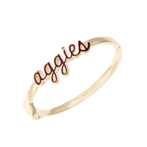 Gold-tone Texas A&M hinge bracelet featuring maroon script Aggies lettering across the front with a polished finish, creating a stylish Aggie jewelry accessory for game days and everyday wear.