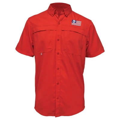 Red Texas A&M fishing shirt featuring short sleeves, button-front closure, vented upper panel, chest pockets, and an American flag-inspired Texas A&M patch on the left chest.