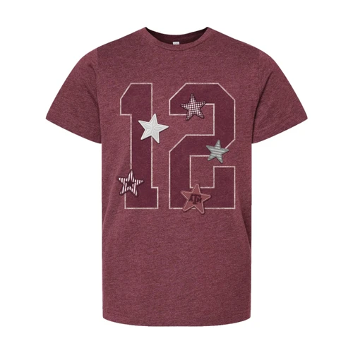 Heathered maroon Texas A&M youth short-sleeve t-shirt featuring a large outlined number 12 graphic decorated with dimensional maroon, white, gray, plaid, striped, and A&M star accents.