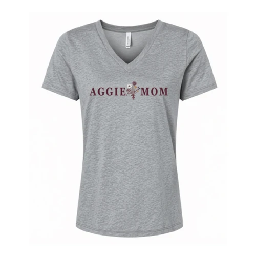 Heather gray Texas A&M Aggie Mom short sleeve V-neck t-shirt featuring maroon Aggie Mom lettering with a delicate multicolored floral design between the words on the front.
