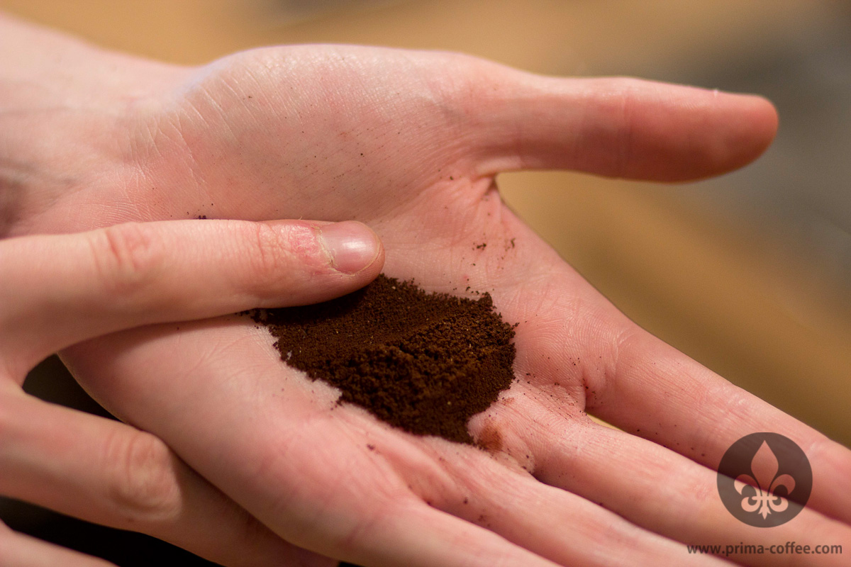 Fine ground coffee for espresso. Coffee ground for espresso