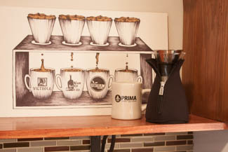 Cafe Solo in its neoprene jacket Cafe Solo in its neoprene jacket, with Prima Coffee diner mug