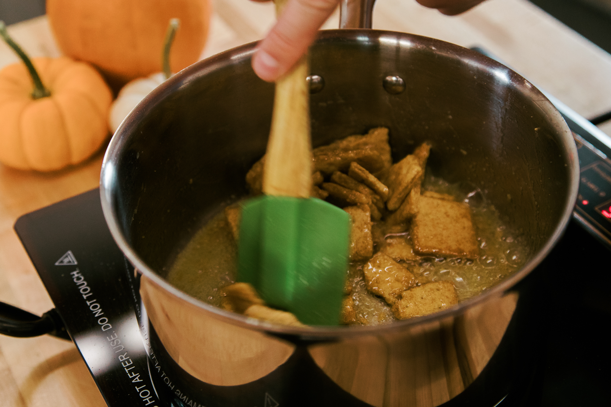 Graham cracker pieces frying in margarine