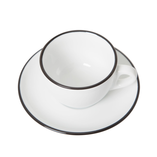 Overhead view of black painted rim cappuccino cup and saucer