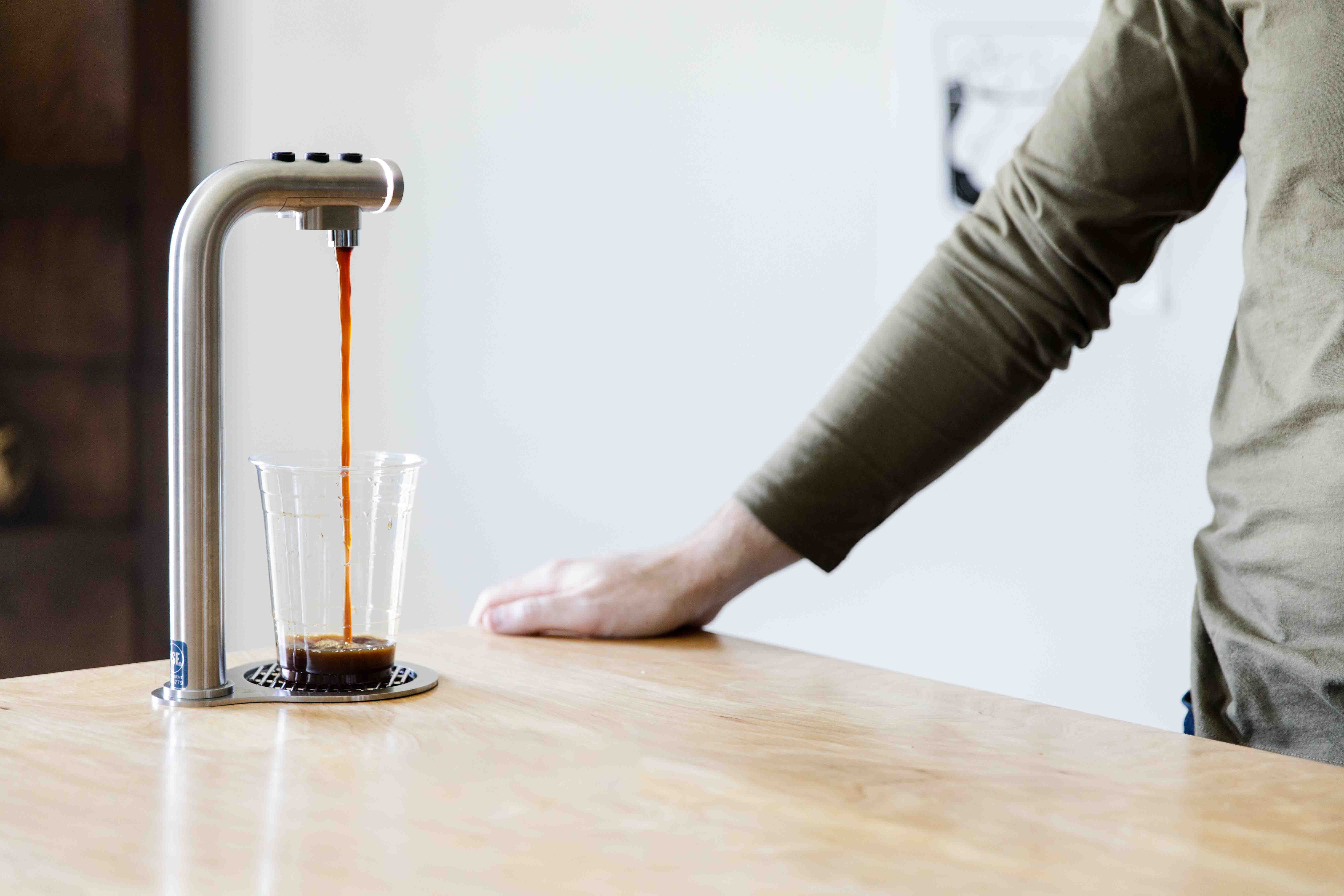 Marco POUR'D dispensing a cold brew shot