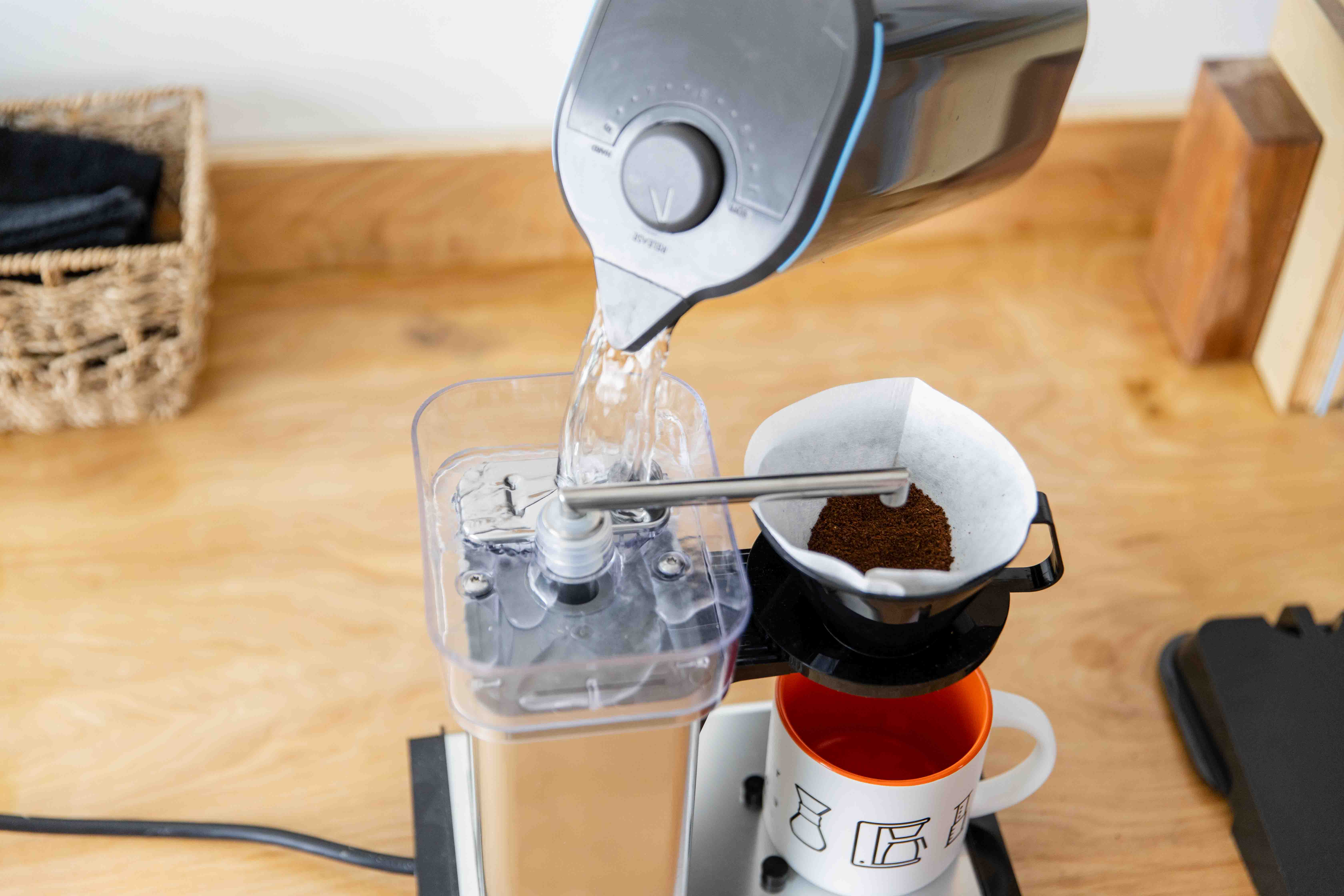 Pouring water into Technivorm Cup-One Coffee Maker