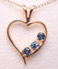 Montana sapphire 3 stone open heart pendant blue 14K gold