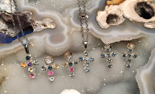 Montana Sapphire 2.25mm 6 stone cross pendant and earrings in sterling silver Montana Sapphire 2.25mm 6 stone cross pendant and earrings in sterling silver