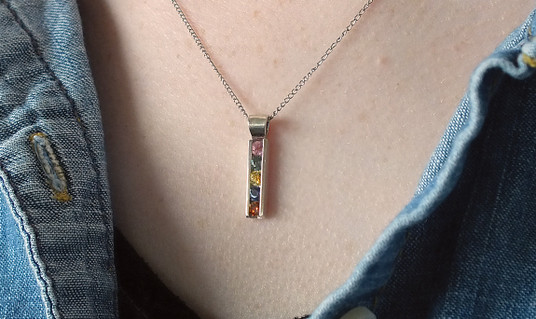 Montana Sapphire 5 stone channel set bar pendant multi on the neck 3mm. Montana Sapphire 5 stone channel set bar pendant multi on the neck 3mm.