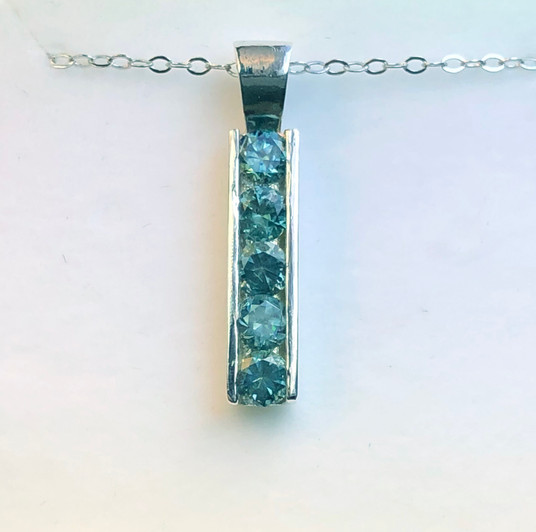 Montana Sapphire 5 stone channel set bar pendant sterling silver 4mm Montana Sapphire 5 stone channel set bar pendant sterling silver 4mm