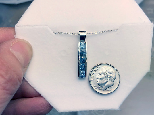 Montana Sapphire 5 stone channel set bar pendant sterling silver 4mm Montana Sapphire 5 stone channel set bar pendant sterling silver 4mm