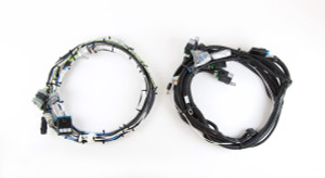 A transmission harness installation kit for an Eaton Autoshift AS2 or Ultrashift DM2 Transmission with GEN 2 electronics.