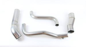 A piping kit for a Peterbilt 386 truck with a Cummins ISX CM570 engine.  The kit includes left side air to air tube, right side air to air tube, lower radiator tube and upper radiator tube.  The tubes are made from 304 stainless steel and offered in a mill finish.