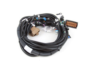 An engine harness to install a Cummins ISX CM2350 engine into a Kenworth NAMUX1 truck