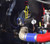 A molded composite air intake elbow for use on a Freightliner Cascadia/122SD truck with a Detroit Diesel Series 60 engine. The intake elbow connects the engine mounted air cleaner to the turbo inlet